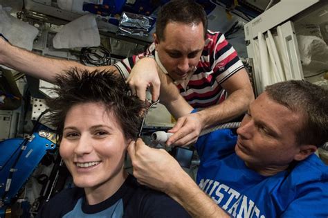 Do astronauts cut their hair?