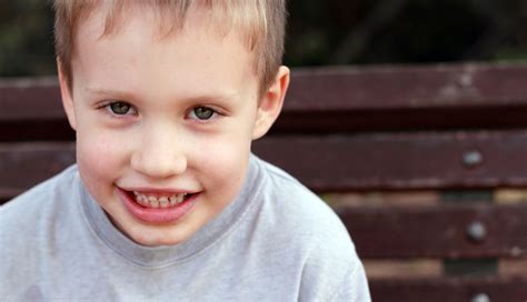 Do autistic kids smile?