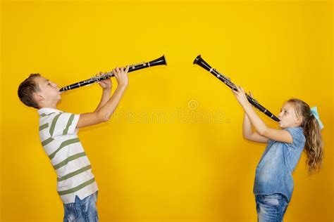Do boys or girls play the clarinet?