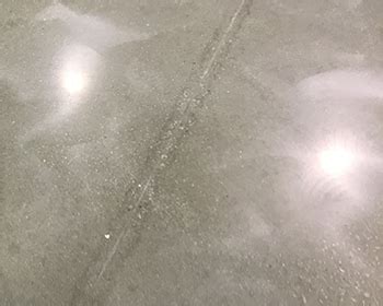 Do concrete floors scratch easily?