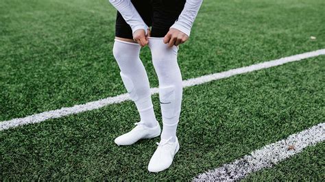 Do footballers wear 2 pairs of socks?