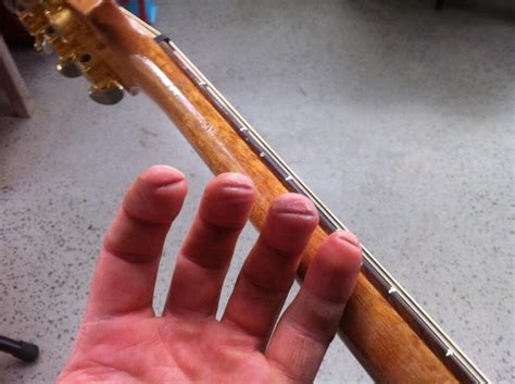 Do guitar players have hard fingers?