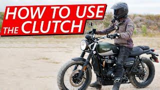 Do you hold the clutch while stopped motorcycle?