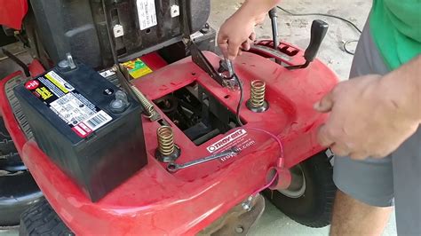 Do you hook up the positive or negative first on a lawn mower battery?