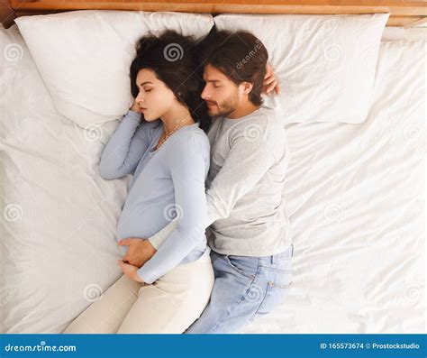 Do you hug your wife while sleeping?