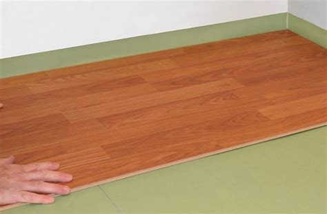 Do you need a moisture barrier for laminate flooring on plywood?