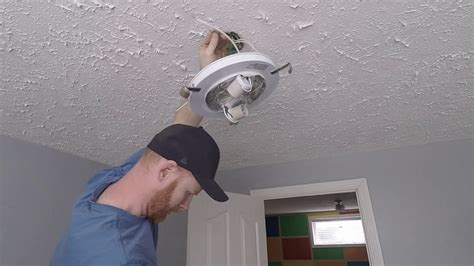 Do you need an electrician to fit a ceiling light?