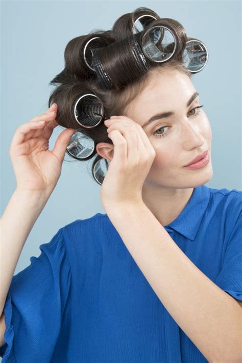Do you put hair rollers in dry hair?