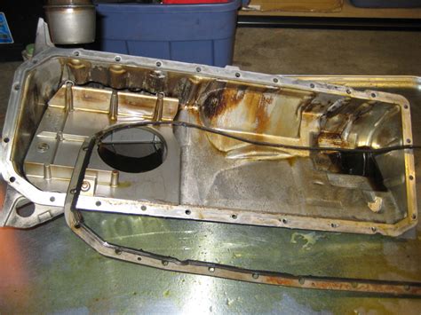 Do you put silicone on oil pan gasket?