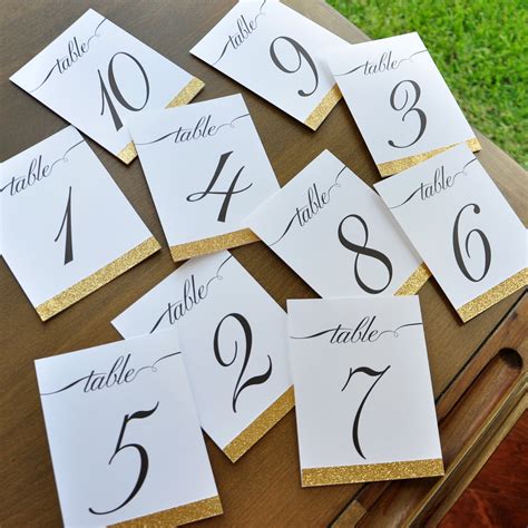 Do you put table numbers on place cards?