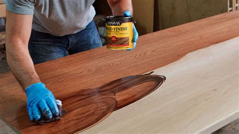 Do you sand after every coat of varnish?