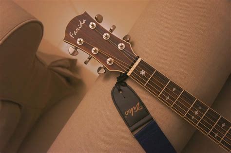 Do you store guitar with strap on?