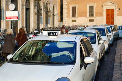 Do you tip taxis in Italy?