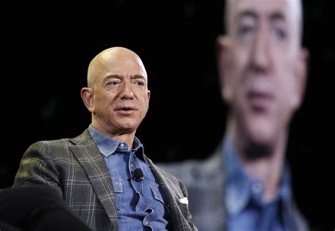 Does Jeff Bezos still own Amazon?