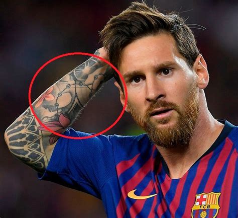Does Messi have tattoos?