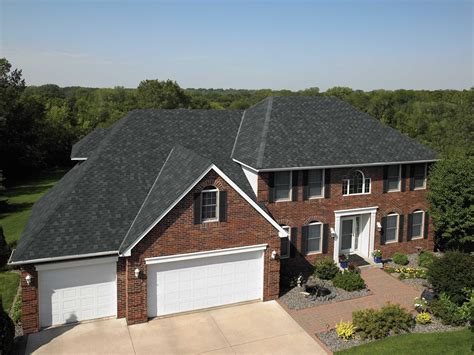 Does a black roof make your house look smaller?