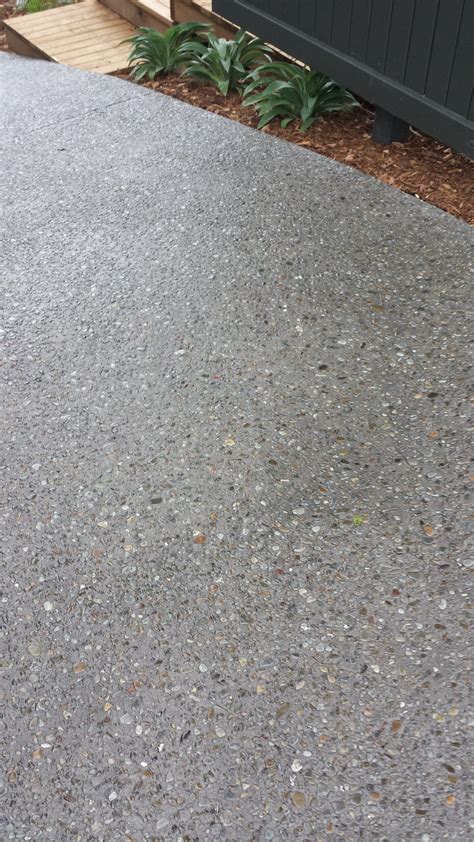 Does acid wash clean concrete?