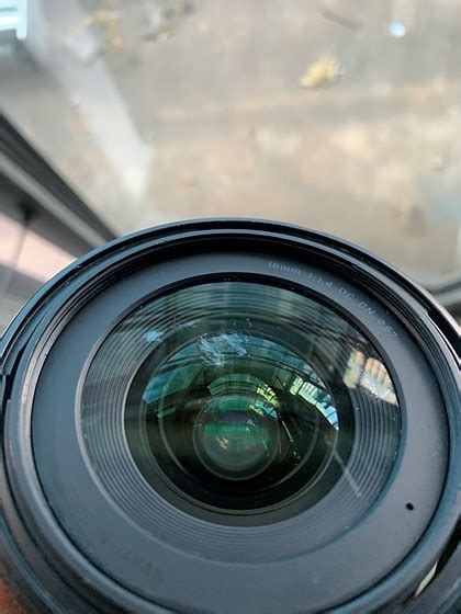 Does alcohol damage camera lens coating?
