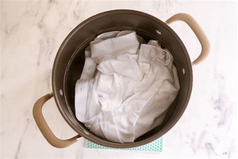 Does boiling clothes shrink them?