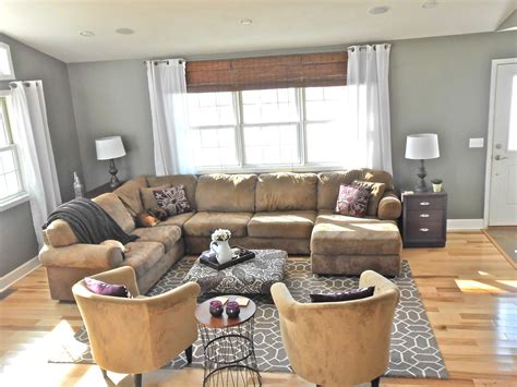 Does brown go with grey sofa?