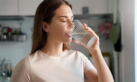 Does drinking water help your period end faster?