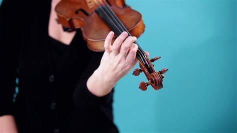 Does playing violin change your hands?