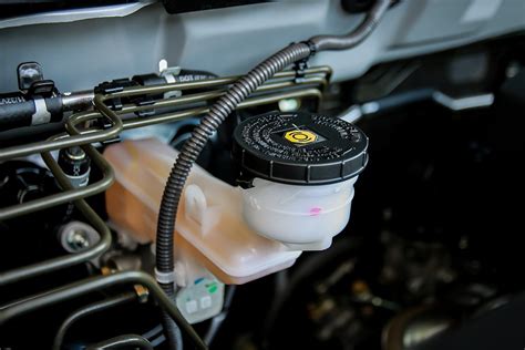 Does power steering fluid sit on top of brake fluid?