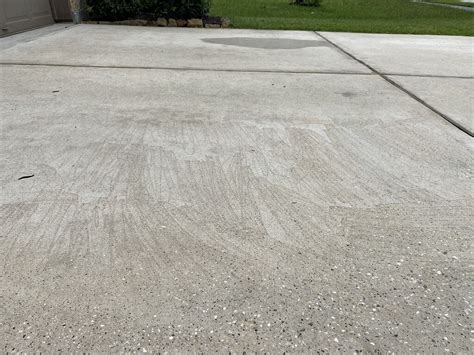 Does pressure washing damage concrete driveway?