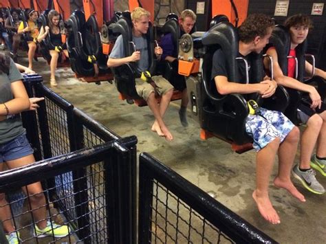 Does putting your hands up help on roller coasters?