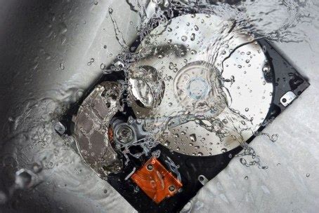 Does soaking hard drive in water destroy it?