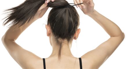 Does tying hair damage it?