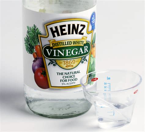 Does vinegar melt glue?