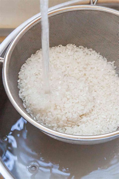 Does washing rice remove carbs?