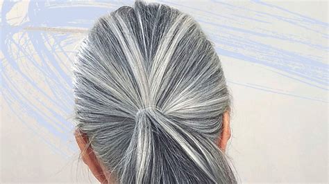 Does white hair age a woman?