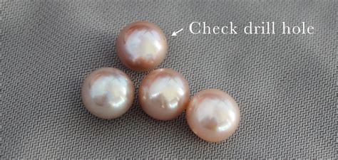 How are pearls marked?
