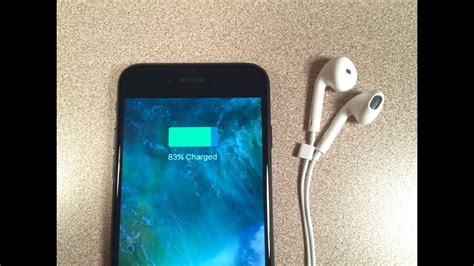 How can I listen to my iPhone while charging?