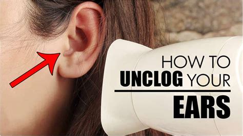 How can I open my blocked ear at home?