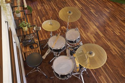 How can I practice drums without bothering my neighbors?