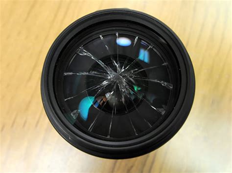 How can I tell if my camera lens is damaged?