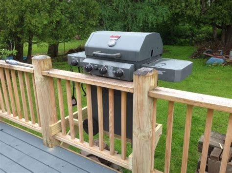 How close can grill be to deck?