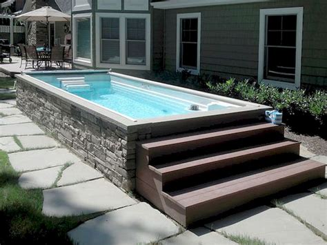 How close to a wall can you build a pool?