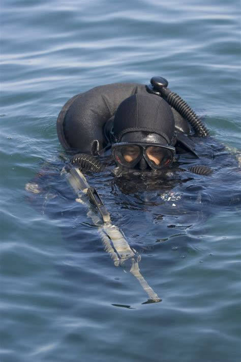 How deep can navy SEALs dive?