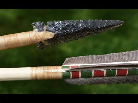 How did Native Americans straighten arrow shafts?