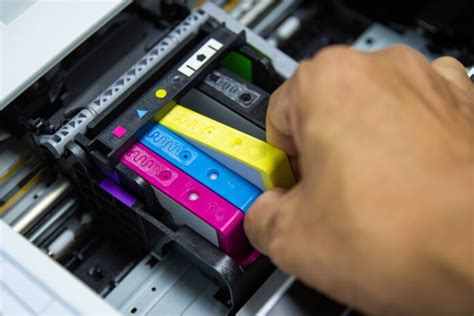 How do I bypass an empty ink cartridge on my HP printer?