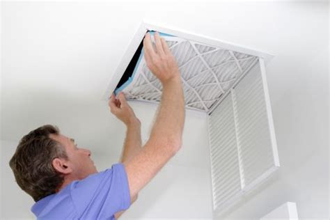 How do I clean my home AC vents?