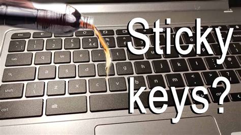How do I clean the keys under my laptop?