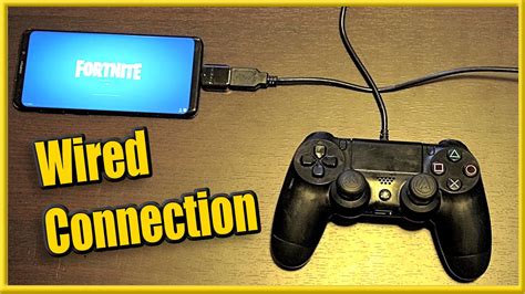 How do I connect a wired controller to my PS4?