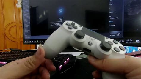 How do I connect two PS4 controllers to my PC via Bluetooth?