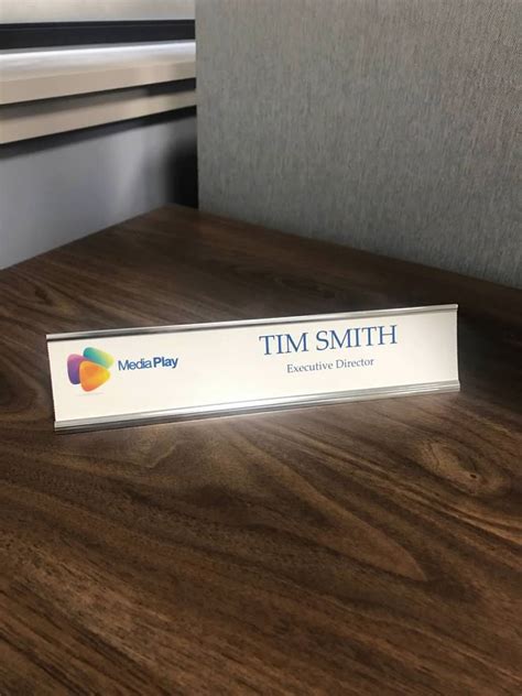 How do I create a name plate in Word?