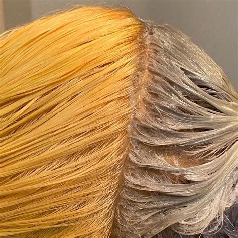 How do I fix my blonde hair from turning orange?